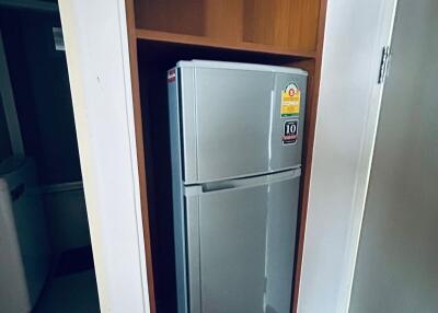 Refrigerator in a small kitchen nook