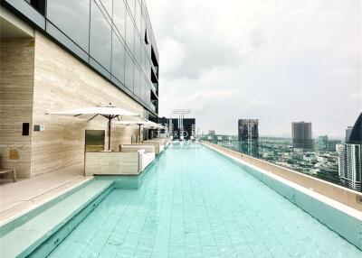 Outdoor rooftop pool with city view