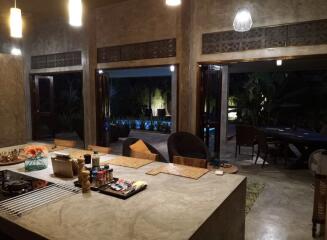 Modern kitchen with island and outdoor dining area