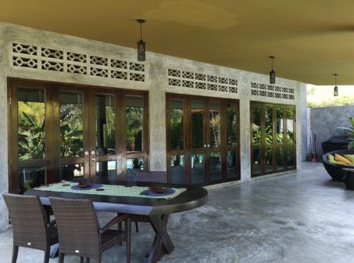 Outdoor patio area with table and chairs