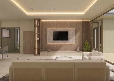 Spacious and modern living room with a wall-mounted TV and elegant lighting