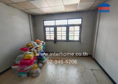 Unfurnished room with windows