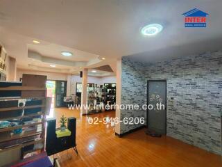 Spacious main living area with modern flooring and natural light