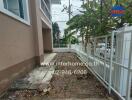 Outdoor area with fencing and driveway