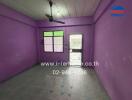 Unfurnished room with purple walls