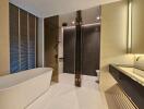 Modern bathroom with a freestanding bathtub and glass-enclosed shower