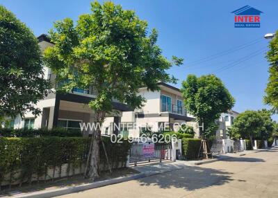 Front view of a residential building on a sunny day