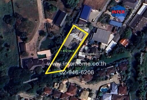 Aerial view of a property highlighted with a yellow border