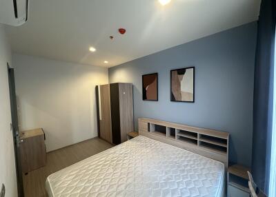 Modern bedroom with a double bed and wardrobe