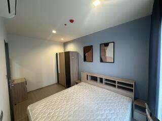 Modern bedroom with a double bed and wardrobe