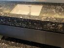 Modern bathroom sink with granite countertop