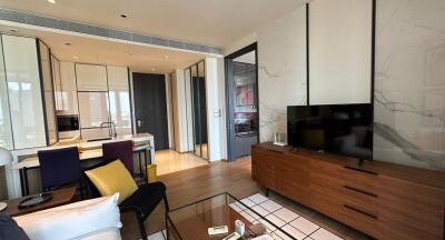 Modern living room with wooden furniture and a TV