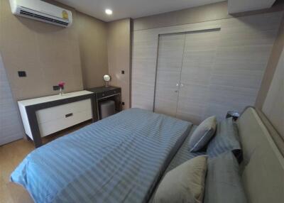 modern bedroom with air conditioning and double bed