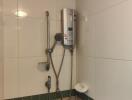 Bathroom with shower and water heater