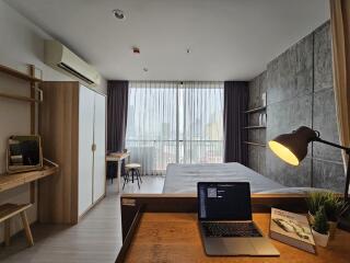 Modern bedroom with workspace