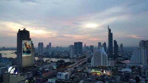 Aerial view of the city skyline at dusk