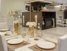 Elegant kitchen and dining area with table set for dinner