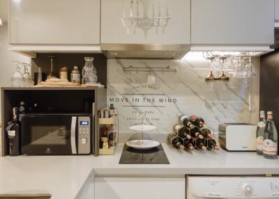 Modern kitchen with appliances and wine storage