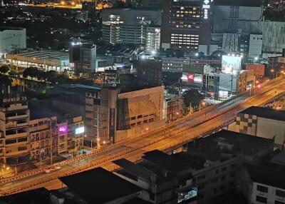 Nighttime view of city buildings and roads