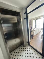 Modern apartment entrance with elevator