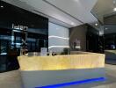 Modern lobby with illuminated reception desk