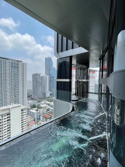 Rooftop pool with a view of city skyscrapers