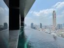 Infinity pool with city skyline view