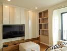 Cozy and modern living room with built-in shelves and wall-mounted TV