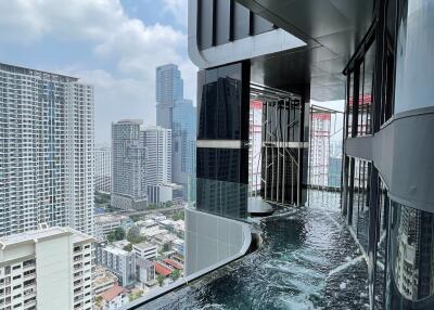 View from modern high-rise building with outdoor pool