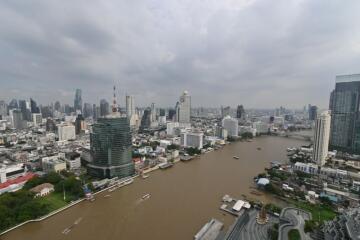 Skyline view of a city with river and high-rise buildings