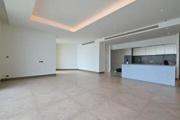 Spacious open-plan living area with kitchen