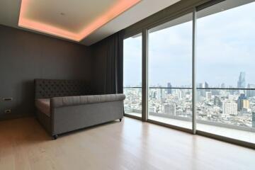 Bedroom with city view and modern furniture