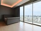 Bedroom with city view and modern furniture