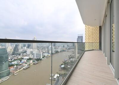 High-rise balcony with cityscape and river view