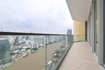 High-rise balcony with cityscape and river view