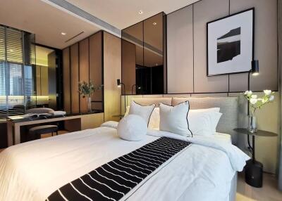 Modern bedroom with stylish decor and large bed