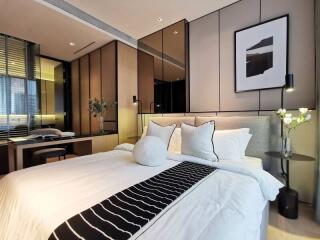 Modern bedroom with stylish decor and large bed