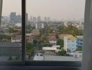 View from a window overlooking a cityscape