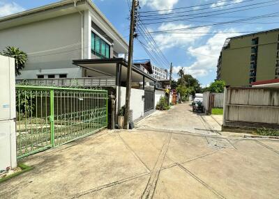 Gated entrance and street view