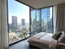 Bedroom with large floor-to-ceiling windows offering a city view