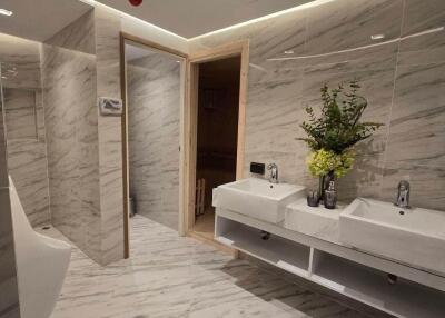 Modern bathroom with marble finishing and twin basins