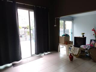 Living room with sliding glass doors and small sitting area