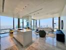 Spacious living area with open kitchen and panoramic city views