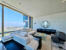 Modern living room with large windows and city view