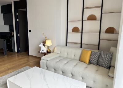 Modern living room with sofa and wall shelves