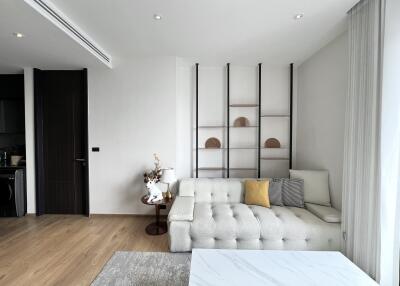 Modern living room with couch and shelving