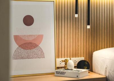 Close-up view of bedside table in a bedroom with modern decor