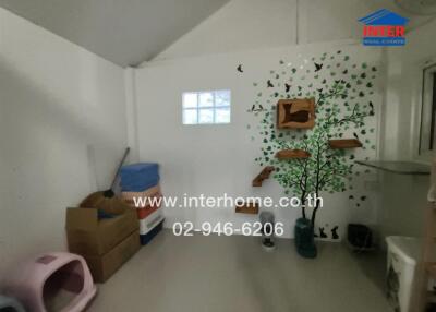Room with wall decals and storage boxes