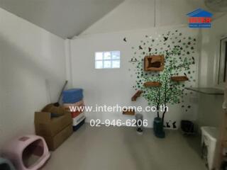 Room with wall decals and storage boxes