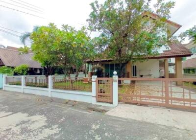 Exterior view of a house with front yard